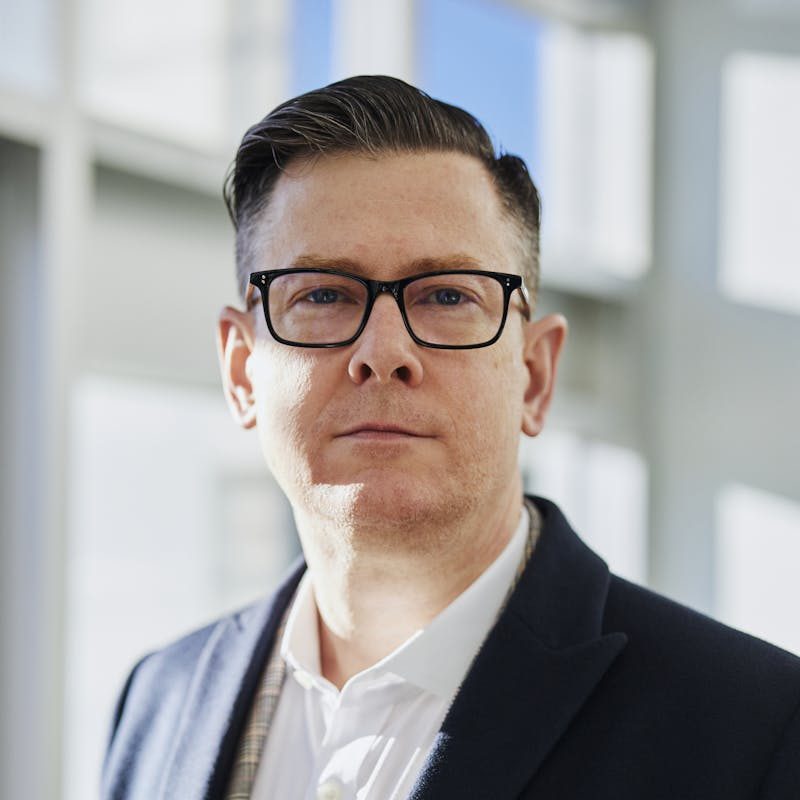 Man Wearing White Dress Shirt and Black Blazer